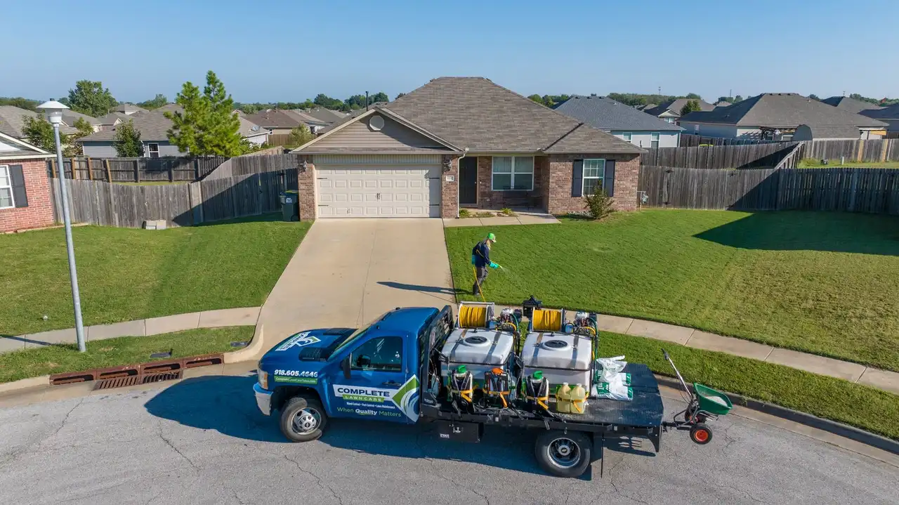 Complete Lawn Care team serving Tulsa metro Bermuda lawns through summer disease season