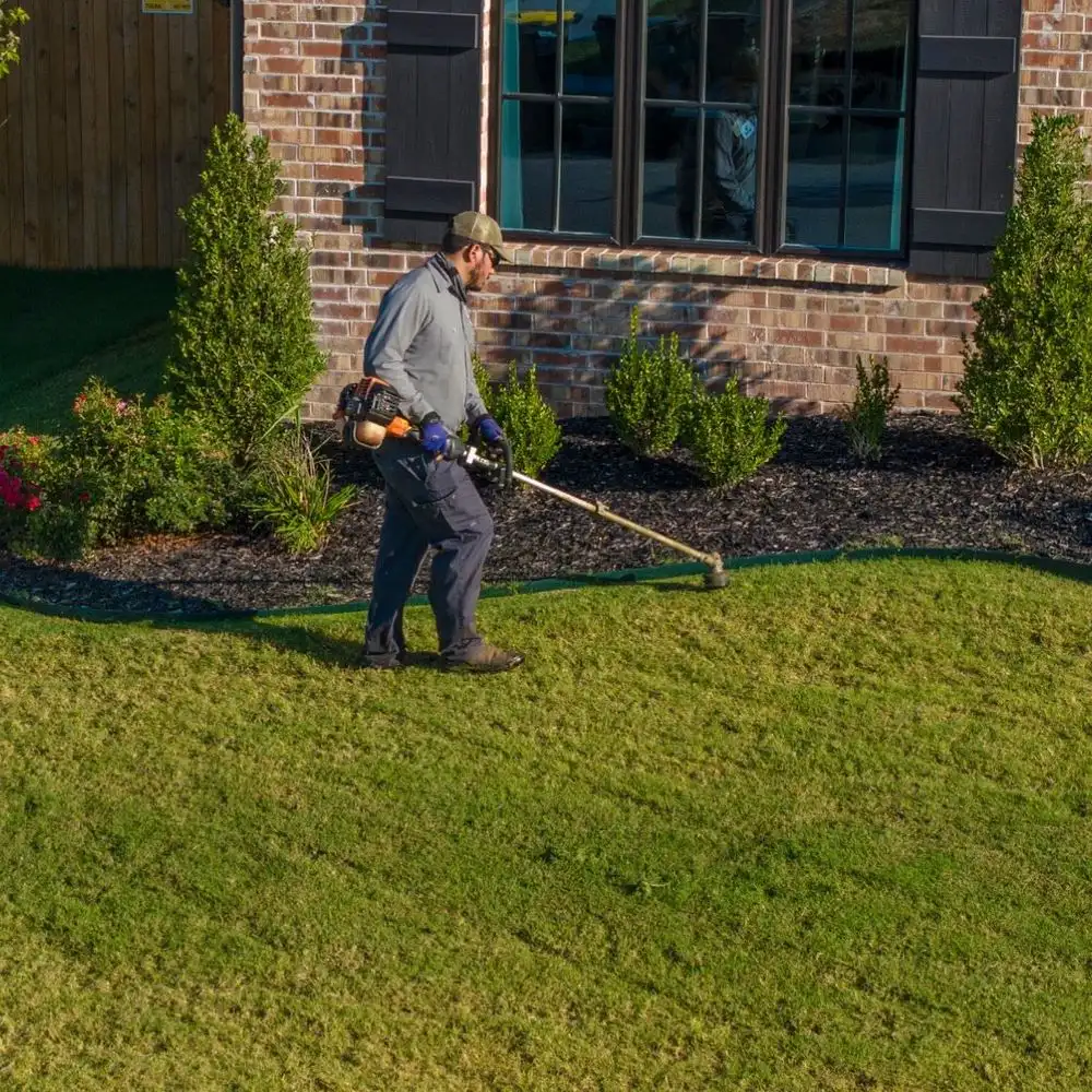 Trimming around landscape beds and a tree ring
